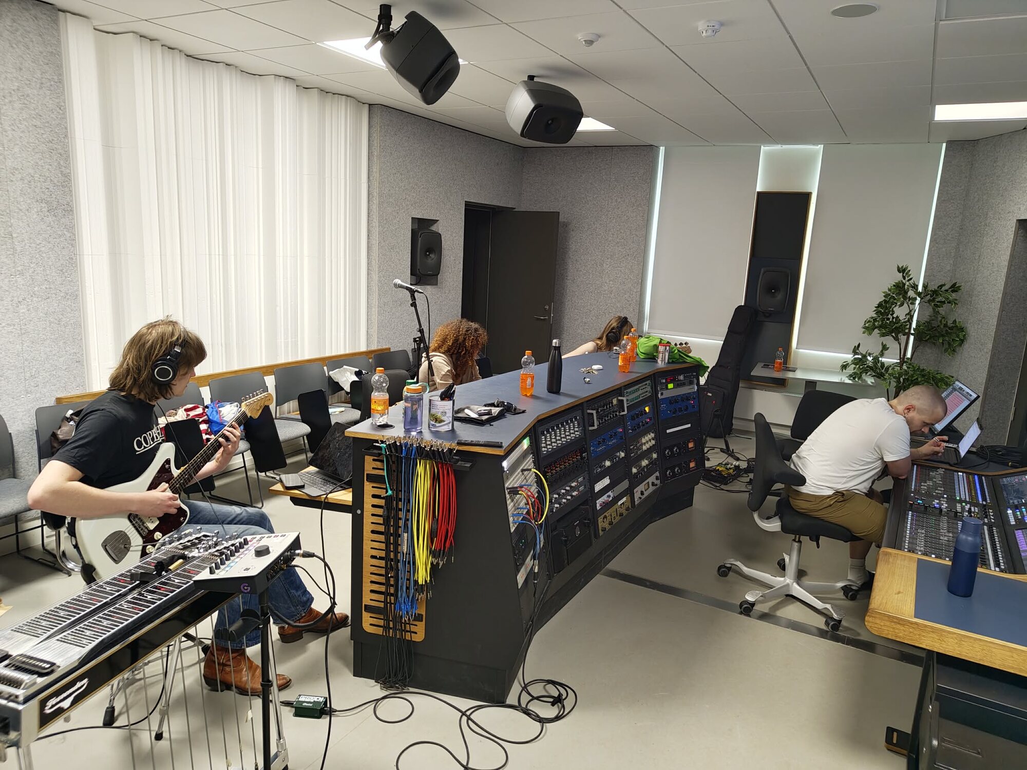 The band in the control room, at the SSL